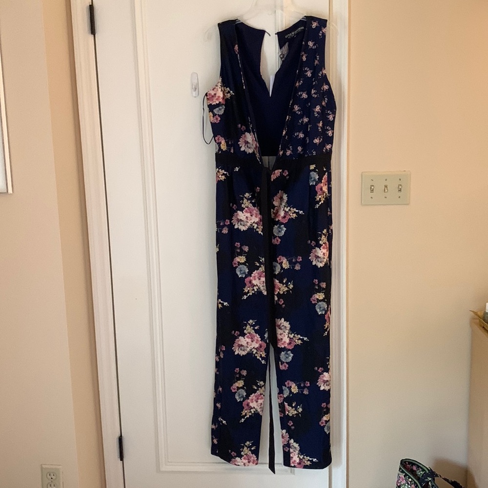 Little mistress navy blue with floral jumpsuit tie waist NWT size 10